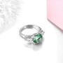 close up of green fluorite and white zircon ring in rhodium over sterling silver