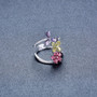 full view of rhodolite garnet and peridot iolite and white zircon ring in rhodium over sterling silver