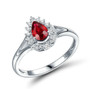 ruby and diamond pear shape halo ring in 18k white gold