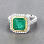 lifestyle view of zambian emerald green gemstone ring in solid 14k yellow gold