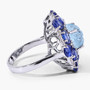 side profile of carved aquamarine kyanite and diamond ring in sterling silver