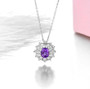 amethyst and white zircon floral halo necklace in rhodium over sterling silver shown in a lifestyle photo