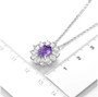 amethyst and white zircon floral halo necklace in rhodium over sterling silver shown for size comparison