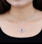 amethyst and white zircon floral halo necklace in rhodium over sterling silver worn around the neck