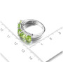 peridot band ring in rhodium over sterling silver shown for size comparison