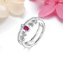 ruby and white zircon double band ring in rhodium over sterling silver shown in a lifestyle photo