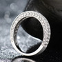side view of white diamond wedding band ring in 14k white gold