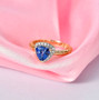 tanzanite and lab diamond trillion halo openwork ring in 10k yellow gold live studio