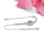 back view of pink topaz and white zircon halo rhodium over sterling silver bracelet