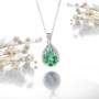 full view of green fluorite and white zircon pear pendant necklace in rhodium over sterling silver
