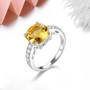side view of natural citrine and white zircon ring in rhodium over 925 sterling silver