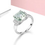 prasiolite and white zircon scroll design ring rhodium over sterling silver shown in a lifestyle photo