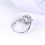 rose quartz and white zircon halo ring in rhodium over sterling silver