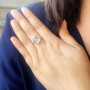 rose quartz and white zircon halo ring in rhodium over sterling silver
