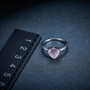 rose quartz 8mm trillion solitaire ring in rhodium over sterling silver shown for size comparison
