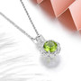 full view of peridot and white zircon halo necklace in rhodium over sterling silver