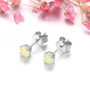 close up of 4mm round faceted natural opal stud earrings in rhodium over sterling silver