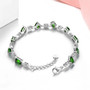 close up of chrome diopside mixed shapes station bracelet in rhodium over sterling silver