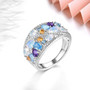 opal and multi gemstone band cluster ring in rhodium over sterling silver shown in a lifestyle photo