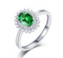 front view of tsavorite garnet and diamond halo 14k white gold ring