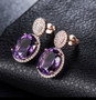 amethyst and diamond drop earrings in 14k rose gold shown in a lifestyle photo