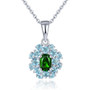 chrome diopside and blue topaz halo pendant necklace in rhodium over sterling silver