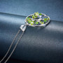 close up of peridot and chrome diopside tree of life rhodium over sterling silver pendant necklace