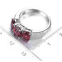 rhodolite garnet and white zircon trilogy ring in rhodium over sterling silver shown for size comparison