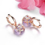 back view of rose de france amethyst and white zircon dangle earrings in 18k rose gold over sterling silver