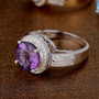 angled view of amethyst and diamond halo 14k white gold ring