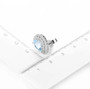 sky blue topaz and zircon pear double halo stud earrings in rhodium over sterling silver shown for size comparison