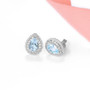 full view of sky blue topaz and zircon pear double halo stud earrings in rhodium over sterling silver