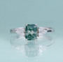 moss agate and cubic zirconia ring in rhodium over sterling silver shown in a lifestyle photo