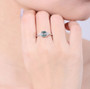 moss agate and cubic zirconia ring in rhodium over sterling silver worn on a hand