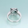 back view of bezel set moss agate and cubic zirconia ring in rhodium over sterling silver