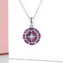 rhodolite garnet and white zircon cluster necklace in rhodium over sterling silver shown in a lifestyle photo