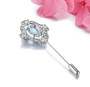 back view of sky blue topaz and white zircon brooch in rhodium over sterling silver