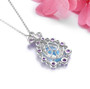 back view of sky blue topaz amethyst and white zircon royal pendant necklace in rhodium over sterling silver