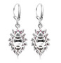 back view of blue star sapphire and rhodolite garnet lever back earrings in rhodium over sterling silver