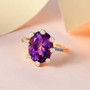 natural amethyst and white zircon crown ring in 18k yellow gold over sterling silver shown in a lifestyle photo
