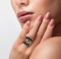 natural multi color tourmaline and black spinel cluster ring in 18k yellow gold over sterling silver worn on a hand