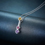multi gemstone bar drop pendant necklace in rhodium over sterling silver shown in a lifestyle photo