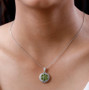 peridot and white zircon pendant necklace in rhodium over sterling silver worn around the neck