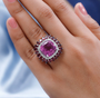 pink quartz rhodolite garnet and white zircon ring in rhodium over sterling silver worn on a hand