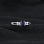 full view of sapphire and diamond emerald cut wedding ring in 14k white gold