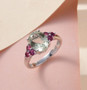 prasiolite and rhodolite garnet ring in rhodium over sterling silver shown in a lifestyle photo