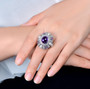 amethyst freshwater pearl and diamond cocktail ring in 14k white gold worn on a hand