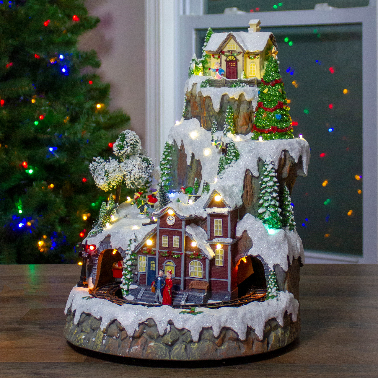 17 White Led Lighted Animated Christmas Village With Moving Train Christmas Central I will add some ribbon so i can hang it on the tree. 17 white led lighted and animated christmas village with moving train