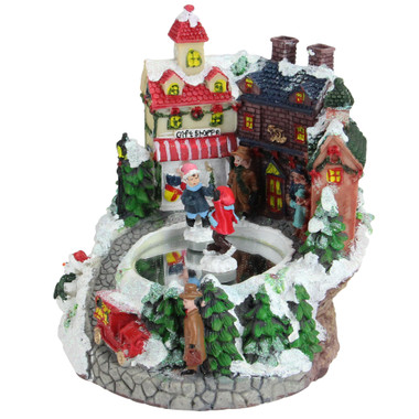 Alpine Corporation Christmas Village with Dancing Ice Skaters and LED Lights