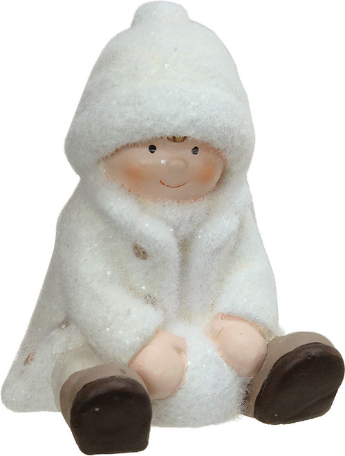 4.75" Creamy White Sitting Boy with Snowball Christmas Table Top Figure - IMAGE 1